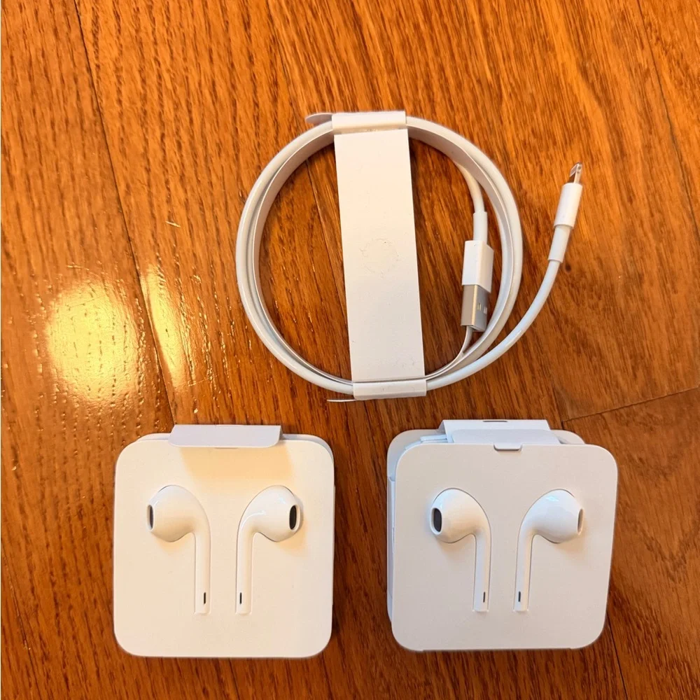 White Wired Earphones and Charging Cable